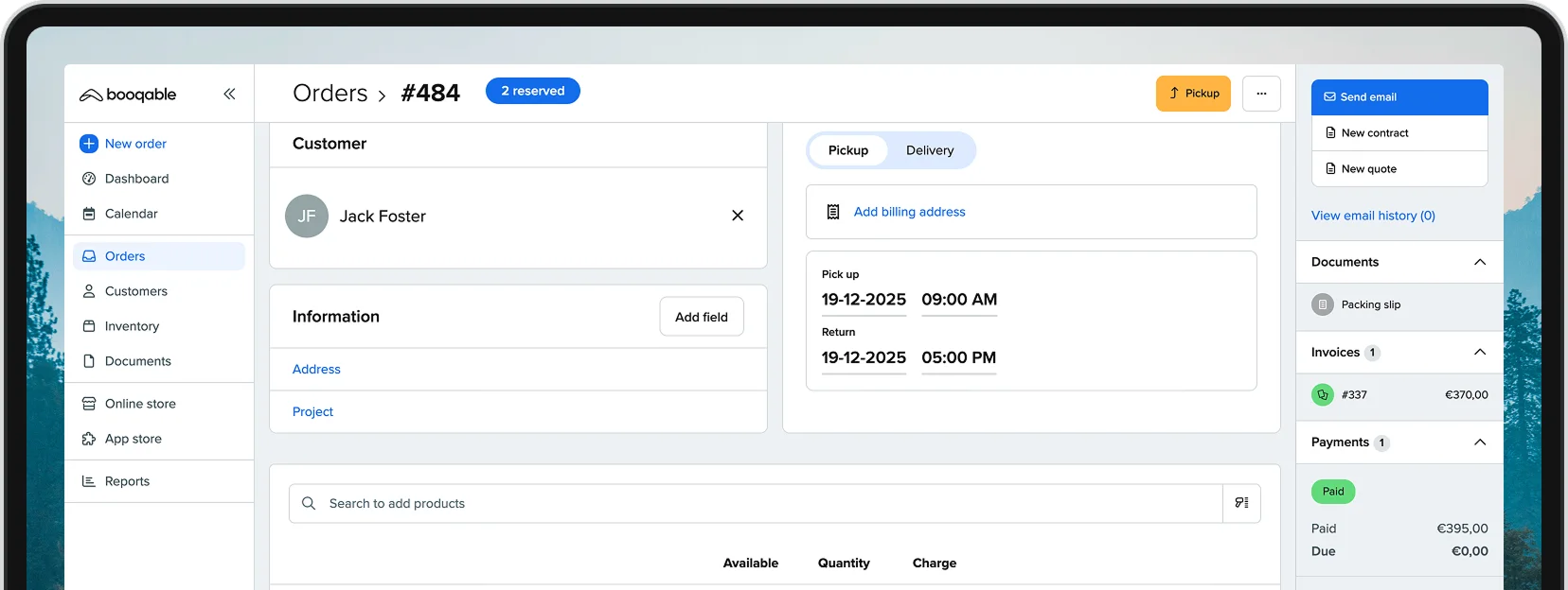 Person managing stock using rental inventory software